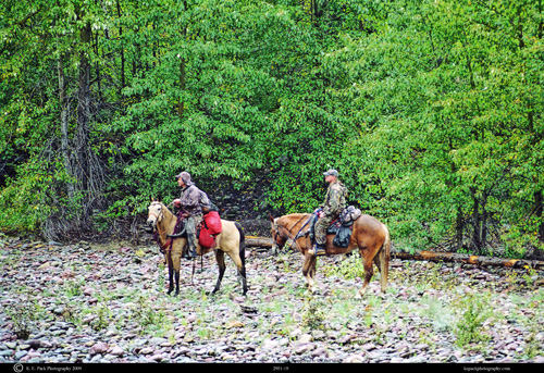 Elk Hunters on Horseback
